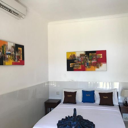 Tudes Homestay Amed Esterno foto