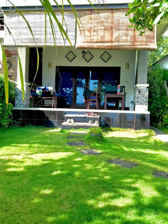Tudes Homestay Amed Esterno foto