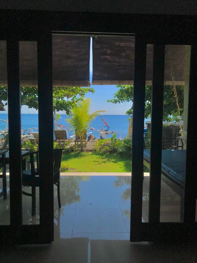 Tudes Homestay Amed Esterno foto
