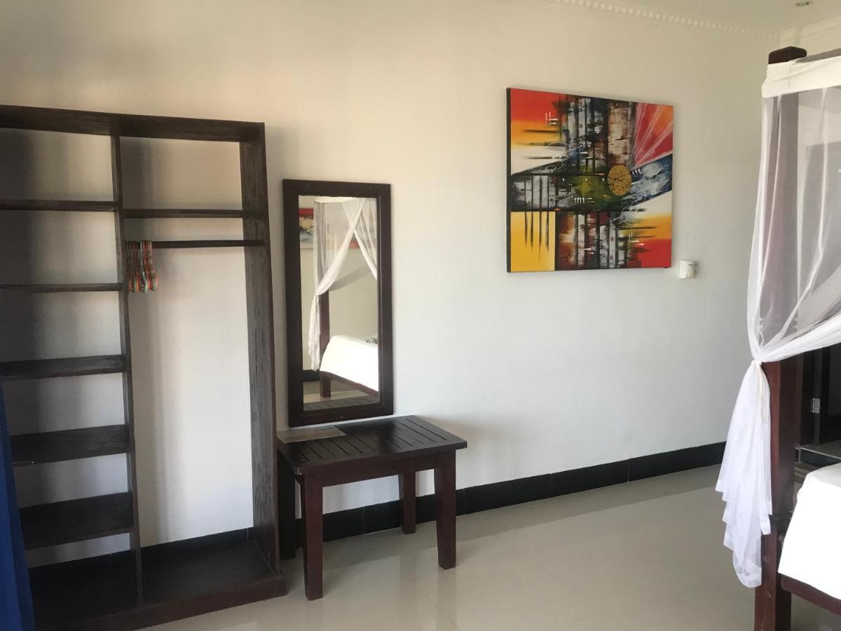 Tudes Homestay Amed Esterno foto