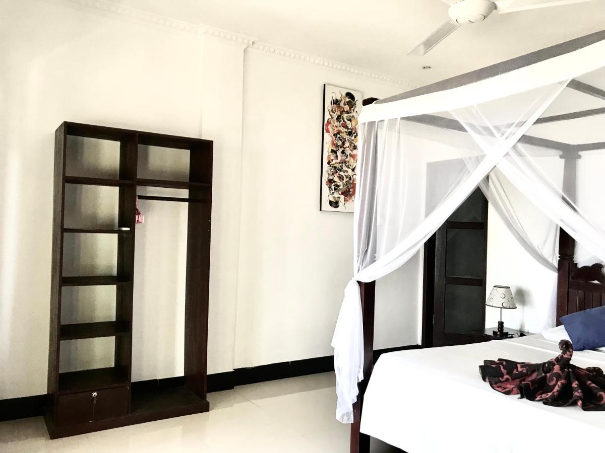 Tudes Homestay Amed Esterno foto