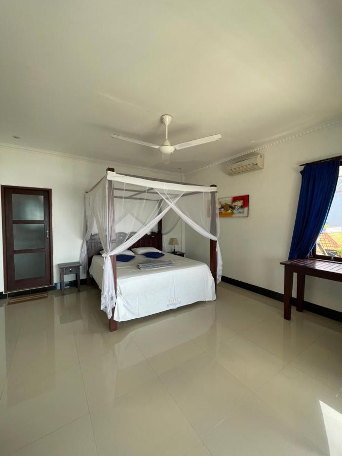 Tudes Homestay Amed Esterno foto