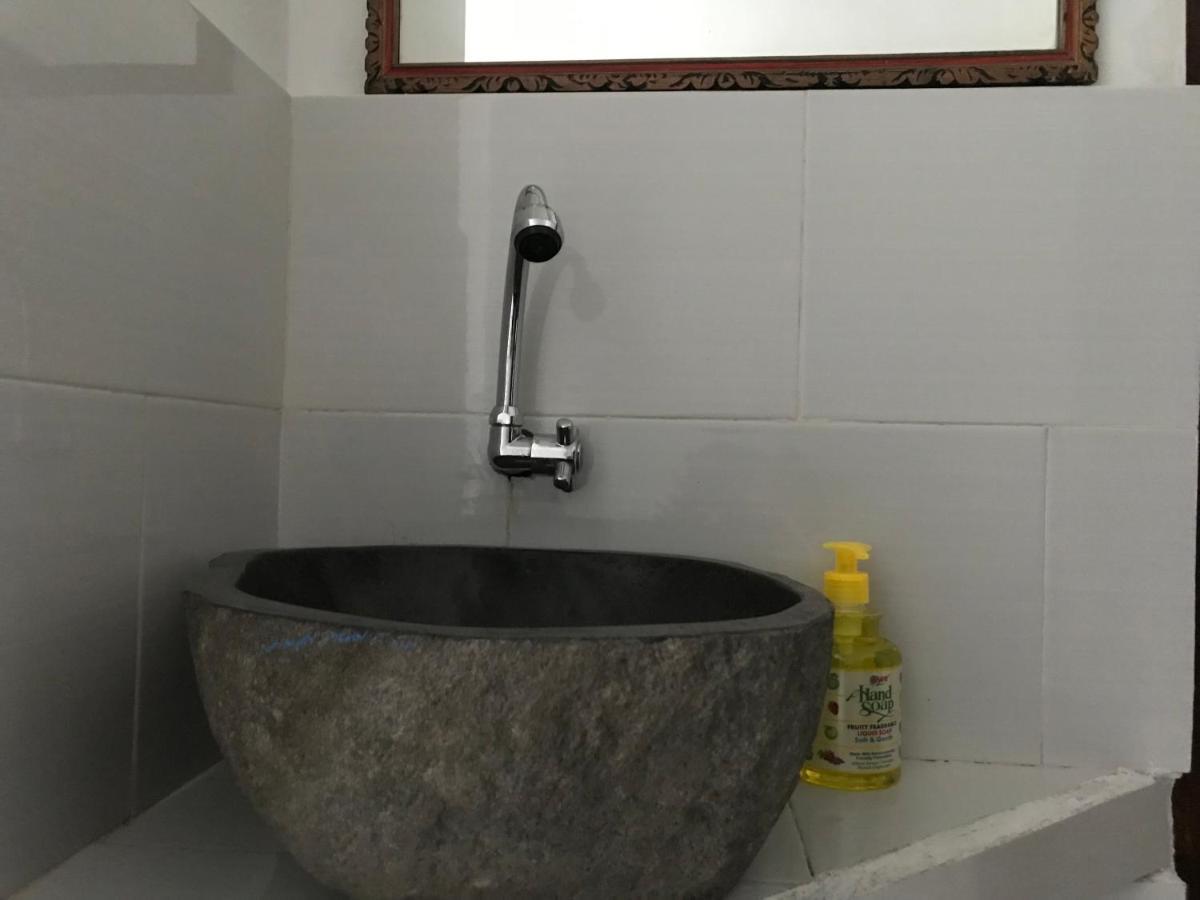 Tudes Homestay Amed Esterno foto