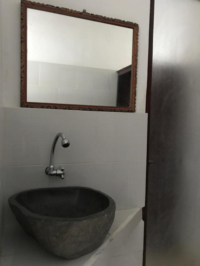 Tudes Homestay Amed Esterno foto