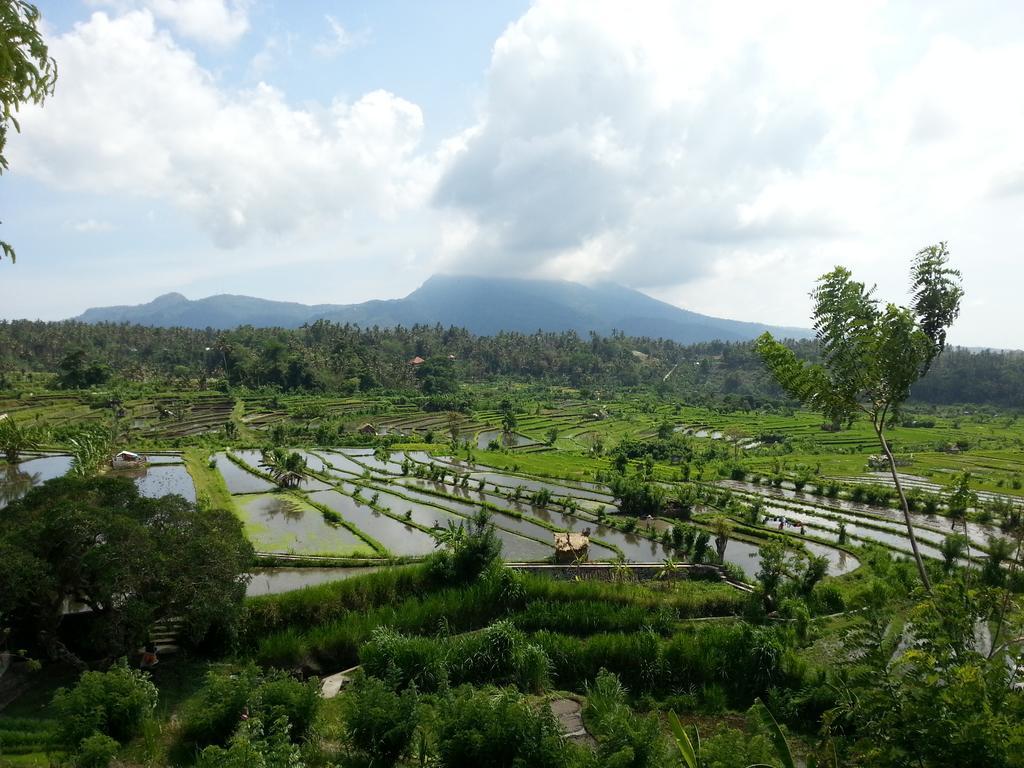 Tudes Homestay Amed Esterno foto