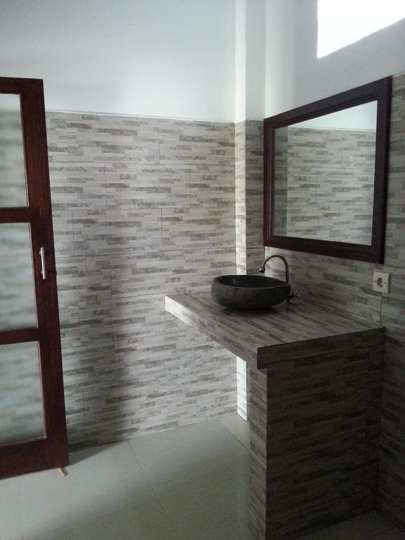 Tudes Homestay Amed Esterno foto